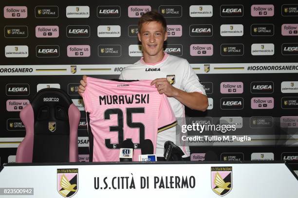 Radoslaw Murawski poses during his presentation as new player of US Citta' di Palermo at Carmelo Onorato training center on July 27, 2017 in Palermo,...