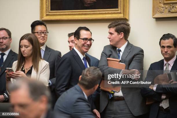 Treasury Secretary Steve Mnuchin arrives to testify before a House Financial Services Committee hearing on the state of the international financial...