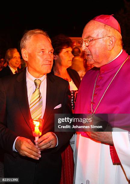 Erwin Huber , head of the Christian Social Union and bishop Wilhelm Schraml of Passau chat together after a katholic light procession on August 14,...