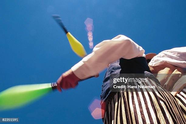 two people standing and juggling, argentina  - circus show stock pictures, royalty-free photos & images