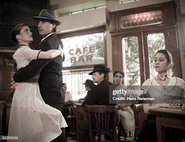 young couple dancing in a cafe, argentina  - tango ストックフォトと画像