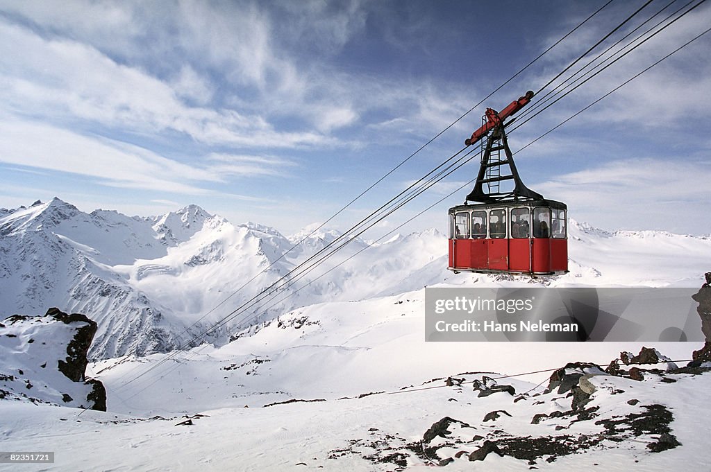 Overhead cable car moving through steel cables, Russia 