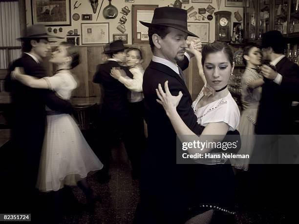 group of people dancing in a cafe, argentina  - tango dancers foto e immagini stock