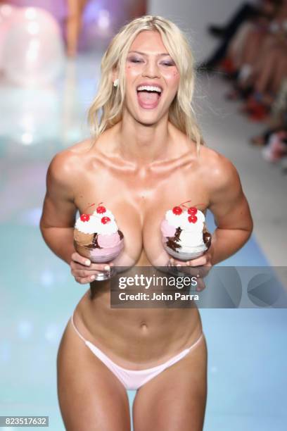 Model walks the runway at the LOLLI SWIM fashion show during FUNKSHION Swim Fashion Week at Funkshion Tent on July 21, 2017 in Miami Beach, Florida.