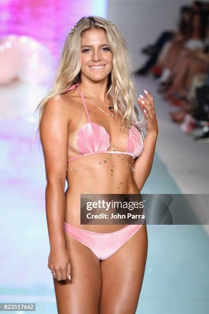 Model walks the runway at the LOLLI SWIM fashion show during FUNKSHION Swim Fashion Week at Funkshion Tent on July 21, 2017 in Miami Beach, Florida.