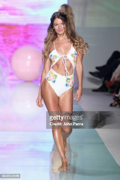 Model walks the runway at the LOLLI SWIM fashion show during FUNKSHION Swim Fashion Week at Funkshion Tent on July 21, 2017 in Miami Beach, Florida.