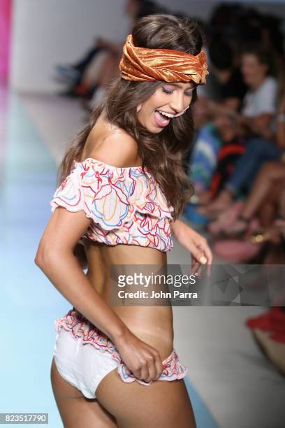Model walks the runway at the LOLLI SWIM fashion show during FUNKSHION Swim Fashion Week at Funkshion Tent on July 21, 2017 in Miami Beach, Florida.