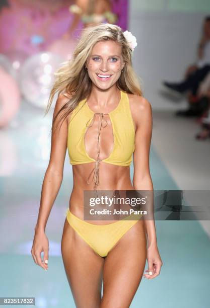 Model walks the runway at the LOLLI SWIM fashion show during FUNKSHION Swim Fashion Week at Funkshion Tent on July 21, 2017 in Miami Beach, Florida.