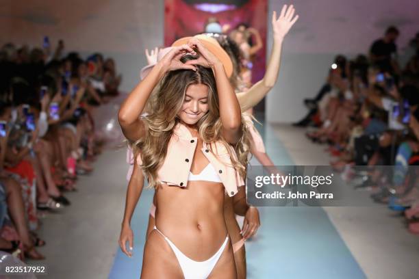 Models walk the runway at the LOLLI SWIM fashion show during FUNKSHION Swim Fashion Week at Funkshion Tent on July 21, 2017 in Miami Beach, Florida.