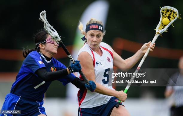 Dorothy Williams of Great Britain is challenged by Nozomi Tanaka of Japan during the Lacrosse Women's match between Great Britain and Japan of The...