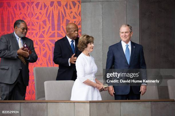 View of, from left, founding director Lonnie Bunch, Congressman John Lewis, former First Lady Laura Bush, and former President George W Bush as they...
