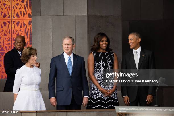 View of, from left, Congressman John Lewis, former First Lady Laura Bush, former President George W Bush, First Lady Michelle Obama, and President...