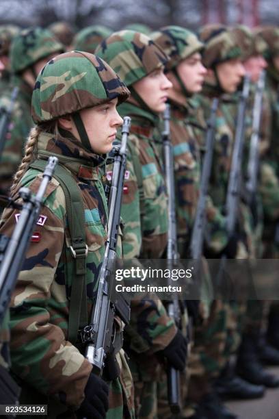 military parade of the proclamation day - latvian woman stock pictures, royalty-free photos & images