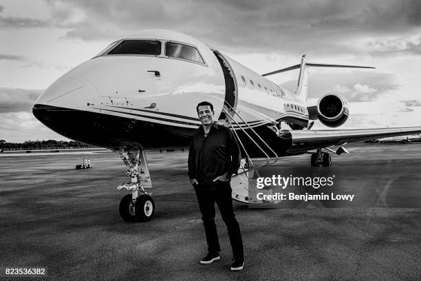 Life coach and business guru Tony Robbins is photographed for Money Magazine on March 17 at his home in Palm Beach, Florida. Robbins poses in front...