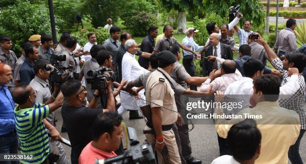 Bihar Chief Minister Nitish Kumar after taking oath at Raj Bhawan on July 27, 2017 in Patna, India. Nitish Kumar walked back into the NDA fold after...