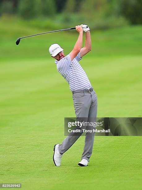 Jimmy Walker of the United States plays his second shot on the 16th fairway during the Porsche European Open - Day One at Green Eagle Golf Course on...