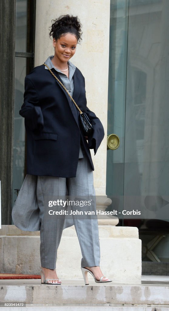 France's First Lady Brigitte Macron Receives Popstar Rihanna At The Elysee Palace