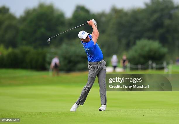 Mikko Ilonen of Finland plays his second shot on the 16th fairway during the Porsche European Open - Day One at Green Eagle Golf Course on July 27,...