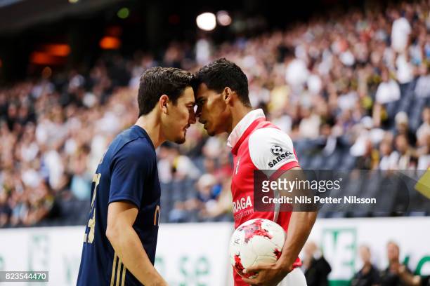 Stefan Ishizaki of AIK and Danilo of SC Braga in discussion during the UEFA Europa League Qualifying match between AIK and SC Braga at Friends arena...