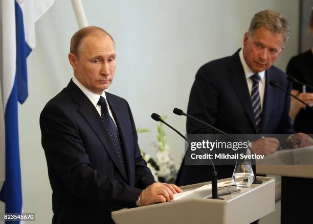 Russian President Vladimir Putin holds a joint press conference with Finland's President Sauli Niinisto July 27, 2017 in Savonlinna, Finland. Putin...