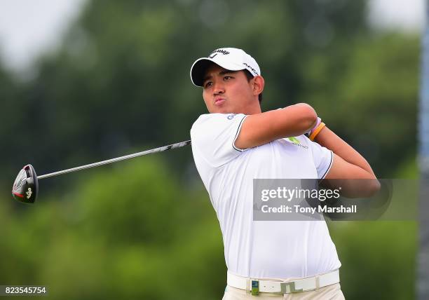 Pavit Tangkamolprasert of Thailand plays his first shot on the16th tee during the Porsche European Open - Day One at Green Eagle Golf Course on July...
