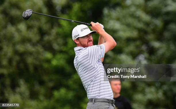 Jimmy Walker of the United States plays his first shot on the 13th tee during the Porsche European Open - Day One at Green Eagle Golf Course on July...