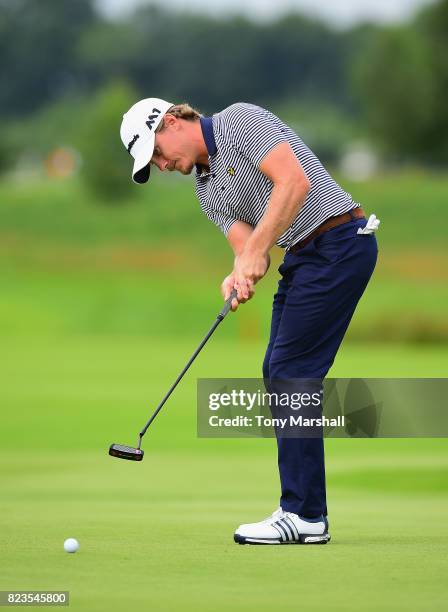 Pontus Widegren of Sweden putts on the 16th green during the Porsche European Open - Day One at Green Eagle Golf Course on July 27, 2017 in Hamburg,...