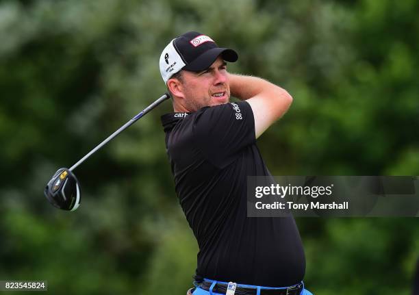 Richie Ramsay of Scotland plays his first shot on the 13th tee during the Porsche European Open - Day One at Green Eagle Golf Course on July 27, 2017...