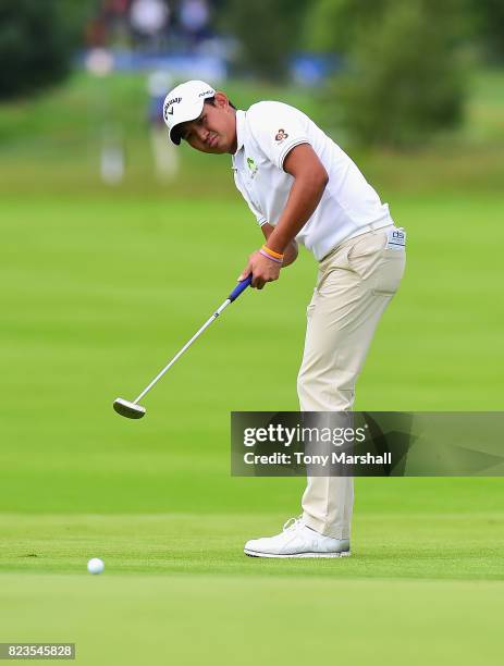 Pavit Tangkamolprasert of Thailand putts on the 16th green during the Porsche European Open - Day One at Green Eagle Golf Course on July 27, 2017 in...