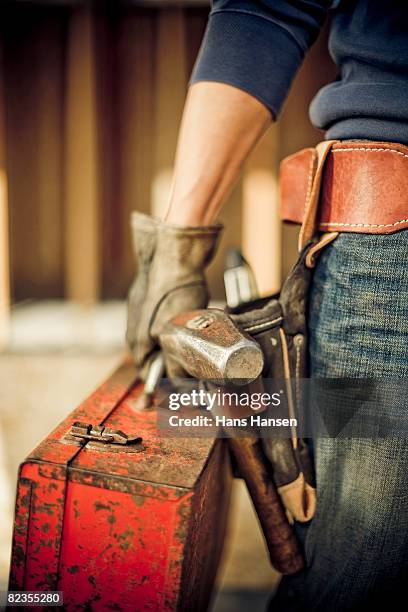 man standing on construction site with tools - old tool stock pictures, royalty-free photos & images