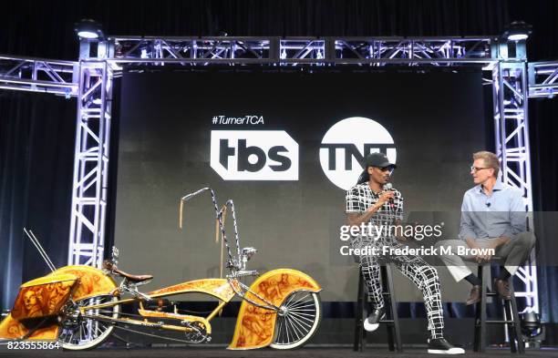 Snoop Dogg and President of TBS & TNT and CEO of Turner Enterprises Kevin Reilly of 'TBS & TNT/Kevin Reilly Executive Session' speak onstage during...