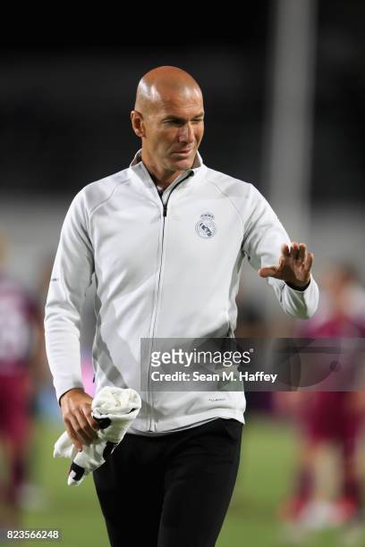 Manager Zinedine Zidane of Real Madrid looks on after a match against Manchester City during the International Champions Cup soccer match at Los...