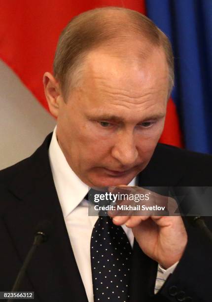 Russian President Vladimir Putin holds a joint press conference with Finland's President Sauli Niinisto July 27, 2017 in Savonlinna, Finland. Putin...