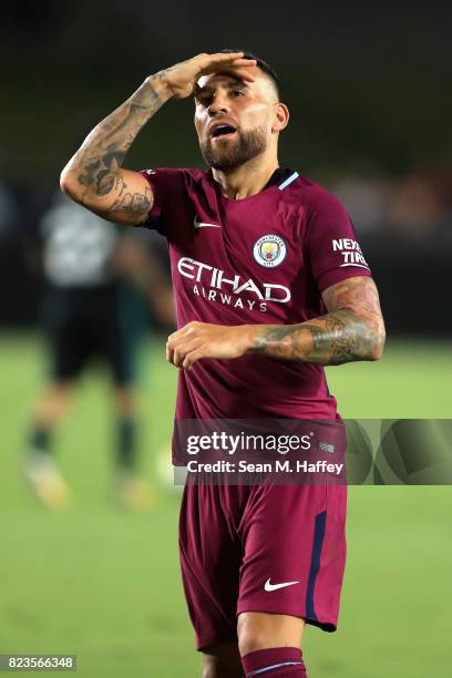 Nicolas Otamendi of Manchester City reacts to scoring a goal against Real Madrid during the second half of the International Champions Cup soccer...
