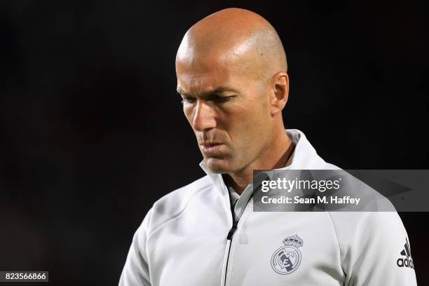 Manager Zinedine Zidane of Real Madrid looks on after a match against Manchester City during the International Champions Cup soccer match at Los...