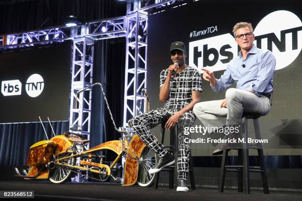 Snoop Dogg and President of TBS & TNT and CEO of Turner Enterprises Kevin Reilly of 'TBS & TNT/Kevin Reilly Executive Session' speak onstage during...