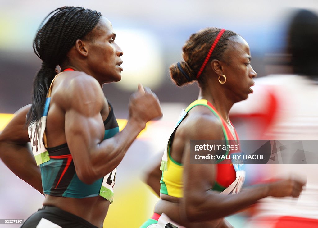 Mozambique's Maria Mutola (L) and Grenad
