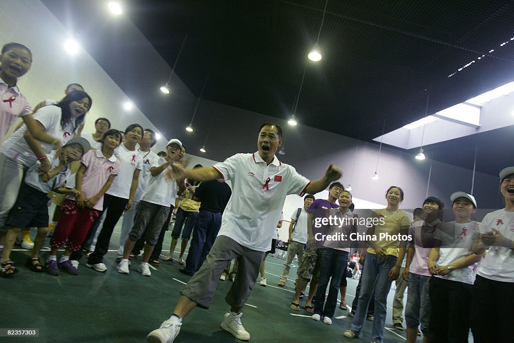 AIDS Orphans Share Olympics With Li Ning