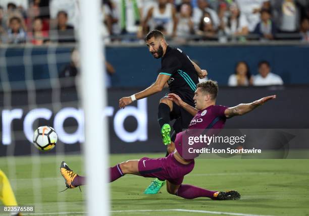 Real Madrid's Karim Mostafa Benzema gets a shot on goal during the game against Manchester City on July 26 at the Los Angeles Coliseum in Los...
