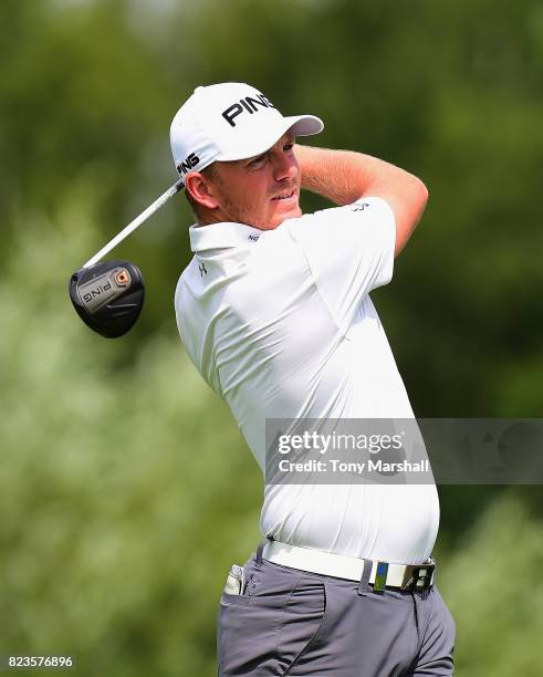 Matt Wallace of England plays his first shot on the 9th tee during the Porsche European Open - Day One at Green Eagle Golf Course on July 27, 2017 in...