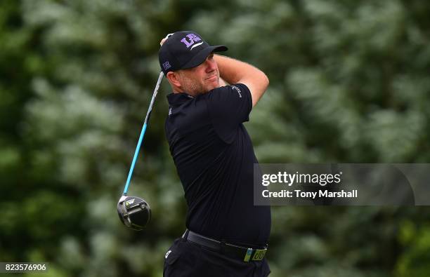 Graeme Storm of England plays his first shot on the 13th tee during the Porsche European Open - Day One at Green Eagle Golf Course on July 27, 2017...