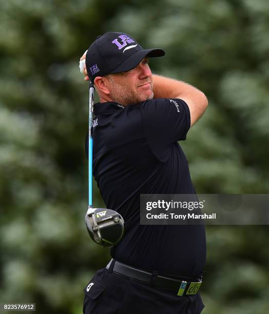 Graeme Storm of England plays his first shot on the 13th tee during the Porsche European Open - Day One at Green Eagle Golf Course on July 27, 2017...