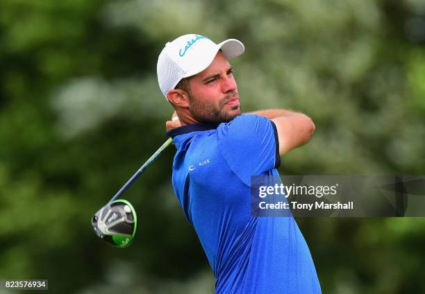 Bernd Ritthammer of Germany plays his first shot on the 13th tee during the Porsche European Open - Day One at Green Eagle Golf Course on July 27,...