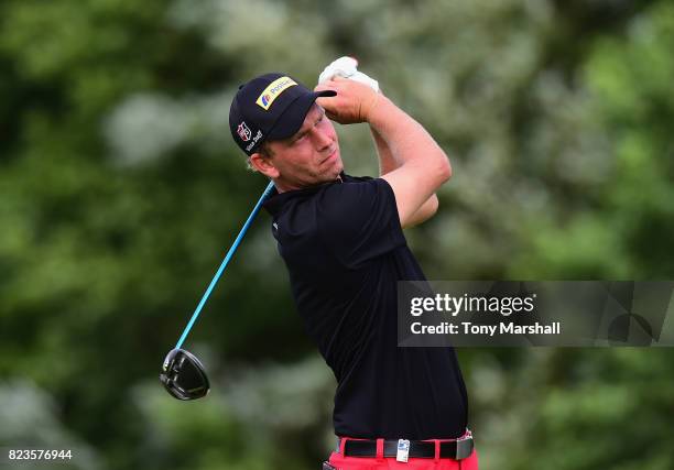 Marcel Siem of Germany plays his first shot on the 13th tee during the Porsche European Open - Day One at Green Eagle Golf Course on July 27, 2017 in...