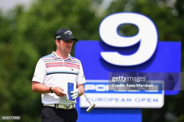 Marc Warren of Scotland prepares to play his first shot on the 9th tee during the Porsche European Open - Day One at Green Eagle Golf Course on July...
