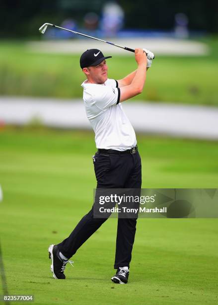 Paul McBride of Ireland plays his second shot on the 9th fairway during the Porsche European Open - Day One at Green Eagle Golf Course on July 27,...