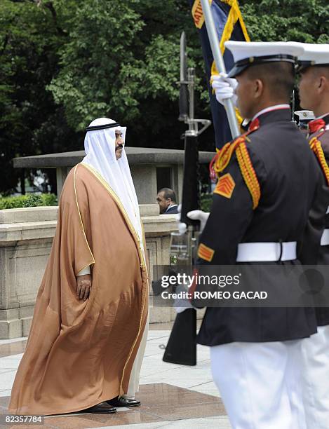 Kuwait's Prime Minister Sheikh Nasser Mohammed al-Ahmed al-Sabah pay tribute during the wreath laying ceremony at the monument of Jose Rizal in...
