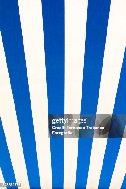 blue and white stripped awning - striped awning stock pictures, royalty-free photos & images