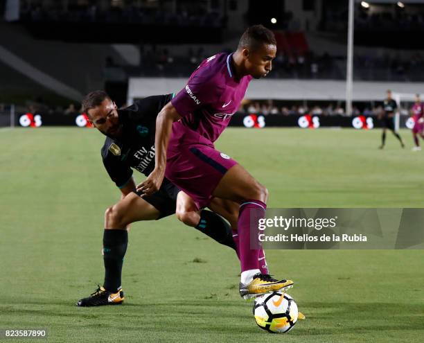 Dani Carvajal of Real Madrid and Danilo of MAnchester City compete for the ball during the International Champions Cup 2017 match between Manchester...