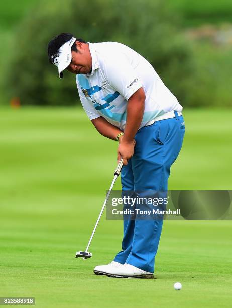 Kiradech Aphibarnrat of Thailand putts on the 9th green after during the Porsche European Open - Day One at Green Eagle Golf Course on July 27, 2017...